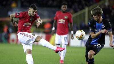 Charles De Ketelaere of Brugge takes on Bruno Fernandes of Manchester United in Belgium. EPA