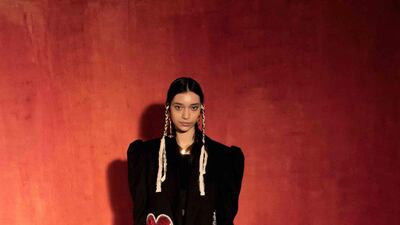 Adorned with an evil eye and pomegranate symbols, a look by Osman Yousefzada for autumn / winter 2021. Courtesy Osman Yousefzada