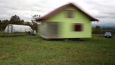 A rotating house, built on a platform using electric motors and wheels from a military transporter, in Srbac, Bosnia and Herzegovina. Photo: Reuters