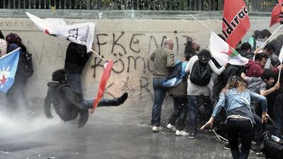 Riot police use water cannons and tear gas to disperse people who were protesting the Soma mine accident that killed 301 miners, in Istanbul, Turkey. Turkey’s Energy Minister Taner Yildiz said Saturday that crews had found more bodies overnight, raising the death toll to 301. AP