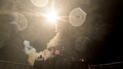 A US warship launches an attack during a wave of strikes on Iran. Reuters