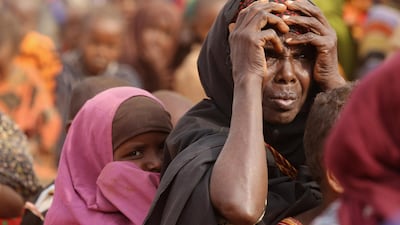 Somalian refugees wait in the registration area of the Ifo refugee camp which makes up part of the giant Dadaab refugee settlement on July 20, 2011 in Dadaab, Kenya. Getty