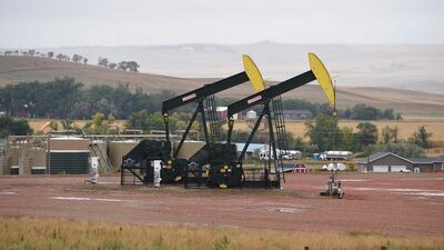 Pump jacks on the Bakken shale formation in North Dakota. US shale is poised for a comeback as prices reached $70 per barrel in January. Robyn Beck / AFP
