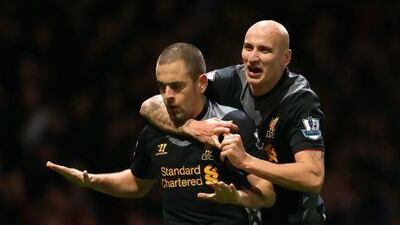 Joe Cole, left, celebrates his goal for Liverpool against West Ham last month in the Premier League. Cole is now poised to re-join his former club West Ham. Scott Heavey / Getty Images
