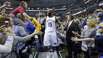 Memphis Grizzlies guard Vince Carter celebrates with fans after his team's Game 5 NBA play-offs win against the Portland Trail Blazers on Wednesday. Mark Humphrey / AP / April 29, 2015
