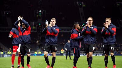 Leipzig's Marcel Sabitzer, Lukas Klostermann, Yussuf Poulsen and Marcel Halstenberg applaud fans at the end of the match. Reuters