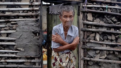 A shivering displaced woman in Beira. AFP