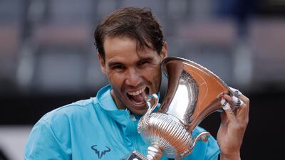 Rafael Nadal of Spain holds the Italian Open trophy after beating Novak Djokovic in the 2019 final. AP Photo