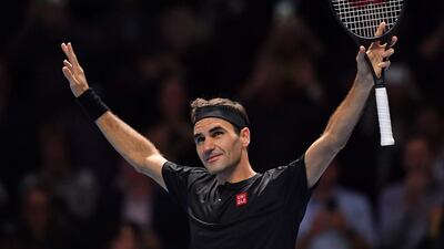 Switzerland's Roger Federer celebrates his straight sets win over Serbia's Novak Djokovic in their men's singles round-robin match. The result means Federer plays Tsitsipas in the semi-finals on Saturday. AFP