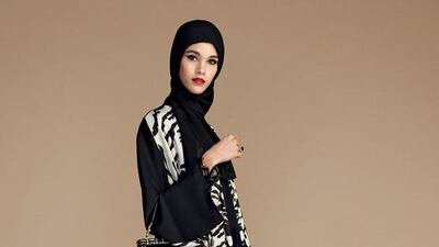 Covetable designs for Eid include classic black abayas and verdant print kaftans and jalabiyas, with complementing sandals and pumps in jewel tones of citrine and sapphire. Courtesy Dolce & Gabbana