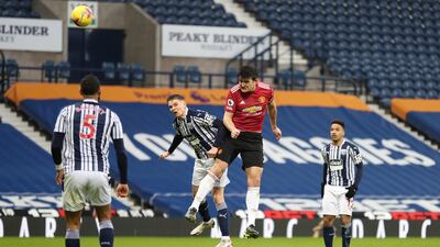 United defender Harry Maguire heads towards goal. Getty