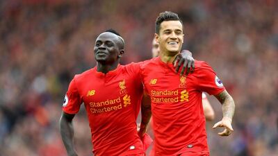 Sadio Mane, left, has started to personify Liverpool, in both his pace and his relentlessness. Dave Howarth / PA