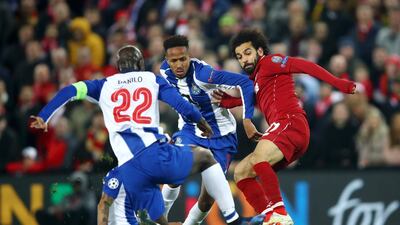 Liverpool's Mohamed Salah battles for possession with Porto's Eder Militao and Danilo Pereira. Getty Images
