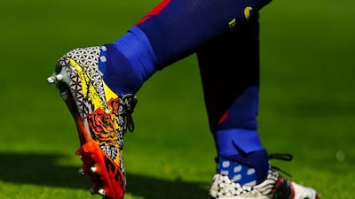 Luis Suarez of Barcelona shown with a close-up of his boots on the pitch at the Camp Nou on Sunday during his side's La Liga match against Rayo Vallecano. David Ramos / Getty Images