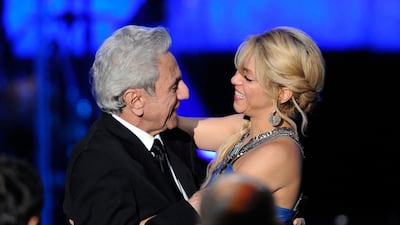 William Mebarak Chadid embraces his pop star daughter singer Shakira during the 2011 Latin Recording Academy's person of the year awards. Getty Images