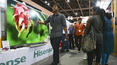 The 84-inch Hisense, ultra-high resolution television that comes with its own stand, and a 2014 model Beemer. The deal, by Sharaf DG, is one of the many bargains up for grabs at Gitex Shopping 2013 at the World Trade Centre’s Exhibition Halls. Lee Hoagland / The National