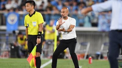 Manchester City manager Pep Guardiola gives instructions from the sidelines. AFP