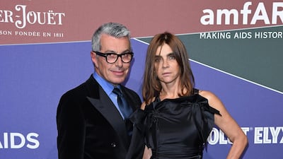 Giorgio Guidetti and Carine Roitfeld attend the Amfar Gala Milano 2019 at Palazzo Mezzanotte on September 21, 2019 in Milan, Italy. Getty Images