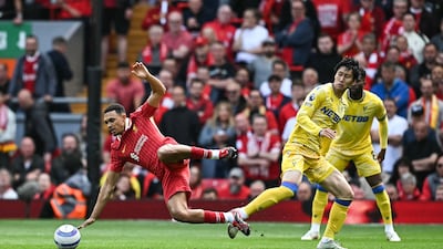 Crystal Palace's Daichi Kamada challenges Liverpool's Trent Alexander-Arnold. AFP