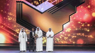 Hussein El Shahat collects the award for Fans Player of the Year Antonie Robertson / The National