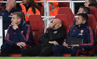 Arsenal caretaker manager Freddie Ljungberg, centre, looks dejected during the recent defeat to Brighton. EPA