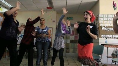 Chana Weinberger, a professional self-defence instructor teaches her students moves at her workshop in Palestinian East Jerusalem.
