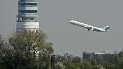 A plane takes off from Vienna Airport. An investigation into two officials has been launched after a court ruling rejected the hub's push for a third runway. Heinz-Peter Bader / Reuters