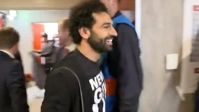 Mohamed Salah goes to greet his Liverpool teammates after their 4-0 victory over Barcelona. Courtesy LFCTV