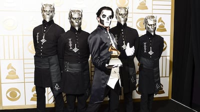 The metal band Ghost, hold up their award for Best Metal Performance for Cirice in the press room during the 58th annual Grammy Awards ceremony at the Staples Center. Mike Nelson / EPA