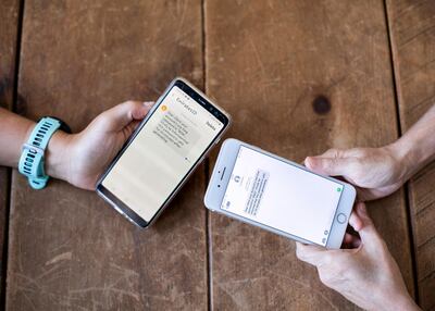 The text message, claiming to be from Emirates ID, received by Emma White and Alice Haine. Reem Mohammed/The National