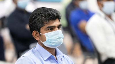 V. Muraleedharan, India's Minister of State for External Affairs addresses workers at Delhi Private School in Dubai, where a programme has been launched to help blue-collar workers learn to use the computer and basic Arabic and English language skills. Reem Mohammed / The National