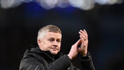 Manchester United manager Ole Gunnar Solskjaer applauds the fans following the League Cup semi-final second leg against Manchester City at the Etihad Stadium. AFP