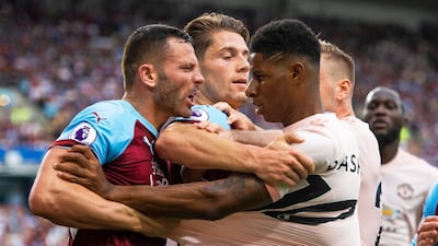 Manchester United's Marcus Rashfordwas shown a red card for this ugly clash with Burnley's Phillip Bardsley in September. EPA