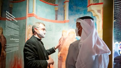 Sheikh Mohamed inside the Holy See Pavilion, which is named after the governing body of the Roman Catholic Church.