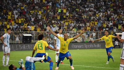 Brazil defender Miranda celebrates after scoring. AFP