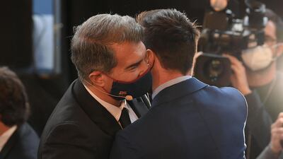 Joan Laporta talks to Lionel Messi at Camp Nou. AFP