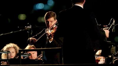 James Ehnes performs with the City of Birmingham Symphony Orchestra at the Corniche Breakwater. Christopher Pike / The National