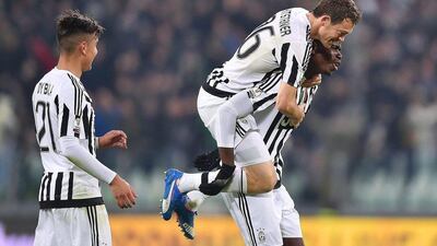 Paul Pogba, right, celebrates his goal against Torino in the Coppa Italia on Wednesday night. Alessandro Di Marco / EPA / December 16, 2015