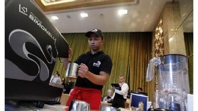 Darwin Malit competes in the UAE Barista Championship at the Middle East Coffee and Tea Convention 2010 in Dubai.