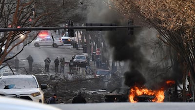 A vehicle is on fire after an explosion in the area of Second and Commerce in Nashville, Tennessee. Buildings shook in the immediate area and beyond after a loud boom was heard early Christmas morning. The Tennessean via AP