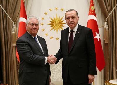 Turkish President Recep Tayyip Erdogan greets US Secretary of State Rex Tillerson in Ankara on February 15, 2018 ahead of a three-hour meeting in the Turkish capital. Kayhan Ozer / Presidential Palace via Reuters