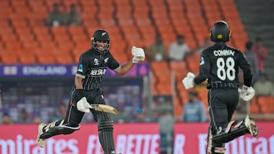 New Zealand's Rachin Ravindra and teammate Devon Conway celebrate as they complete the winning run in their nine-wicket victory over England in the Cricket World Cup match at Narendra Modi Stadium, Ahmedabad on Thursday, October 5. AP
