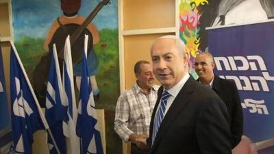 Benjamin Netanyahu leaves after casting his ballot for the Likud party leadership at a polling station in the Jewish settlement of Givat Zeev in the West Bank.