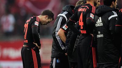 Nicolai Mueller of Hamburger SV is dejected after getting thrashed during the Bundesliga match between FC Bayern Muenchen and Hamburger SV - at Allianz Arena on February 14, 2015 in Munich, Germany. (Photo by Adam Pretty/Bongarts/Getty Images)