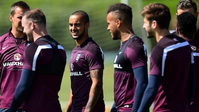 Arsenal's Theo Walcott, centre, shown at England training on Thursday ahead of Sunday's Euro 2016 qualifier against Slovenia. Ben Stansall / AFP / June 11, 2015