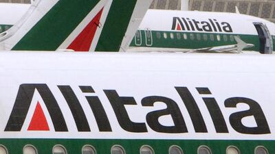 Alitalia airplanes are parked at Fiumicino airport near Rome. Reuters