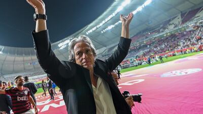 Flamengo coach Jorge Jesus greets the crowd following his team's victory against Saudi's Al Hilal in the Club World Cup semi-final. AFP