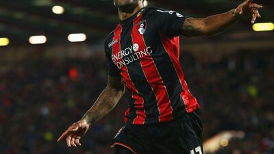 Callum Wilson of Bournemouth celebrates scoring their third goal in a 3-0 Championship win over Bolton on Monday to secure Premier League promotion. Charlie Crowhurst / Getty Images