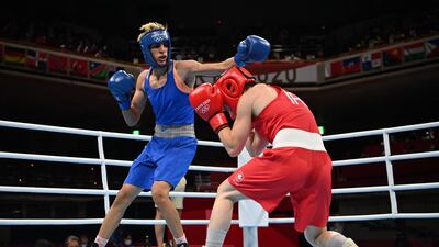 Algeria's Imane Khelif, left, in action against Ireland's Kellie Anne Harrington at the Tokyo 2020 Olympic Games. AFP