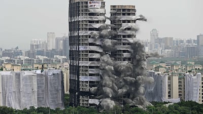Construction on Apex and Ceyanne buildings, popularly known as the Twin Towers, stopped after residents brought a lawsuit against developer Supertech that claimed they violated the site plan and blocked air and sunlight to hundreds of nearby homes. Photo: AFP